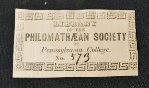 Small rectuangular Philoomathaean Bookplate with a ziigzag border