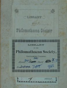 Image of three bookplates stacked on top of one another on the inside cover